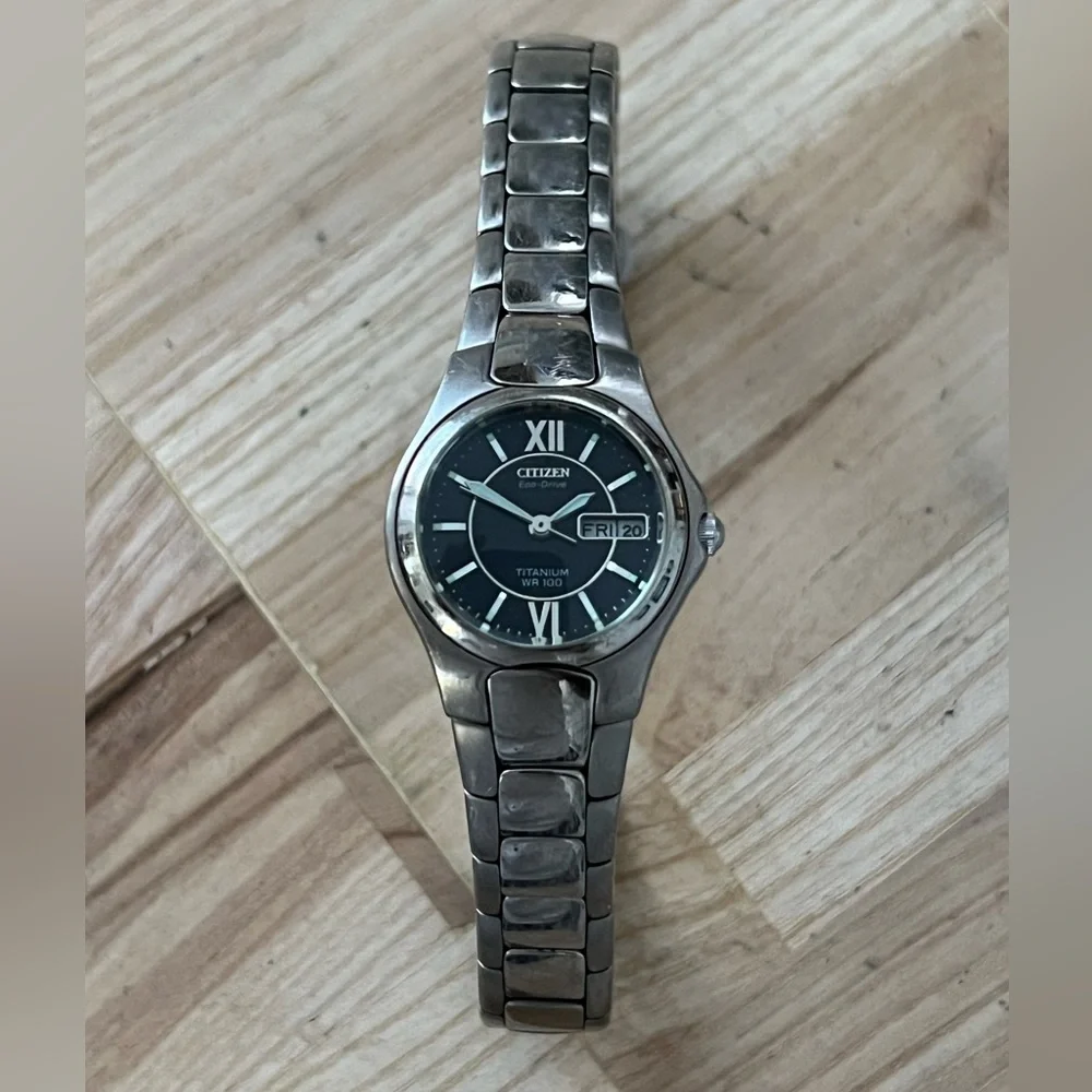 Citizen Eco-Drive Titanium Solar Black Dial Day Date Window Titanium Bracelet